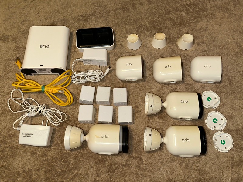 (6) Arlo Pro 4 VMC4041P Spotlight Security Cameras w/ VMB4540 Base & Batteries