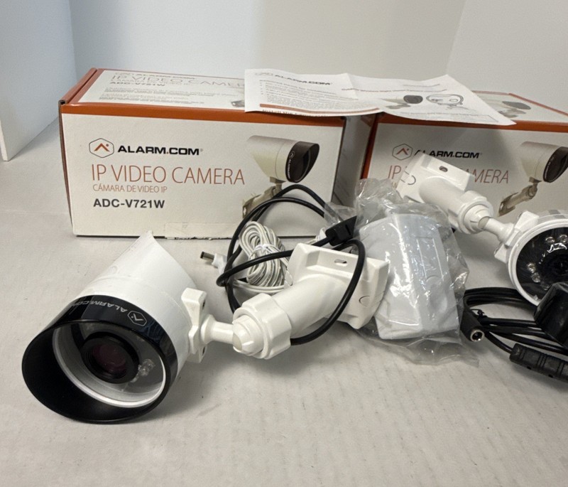 Alarm.com IP Video Camera Bundle - Model: ADC-V721W - LOT OF 2 Untested Read gallery