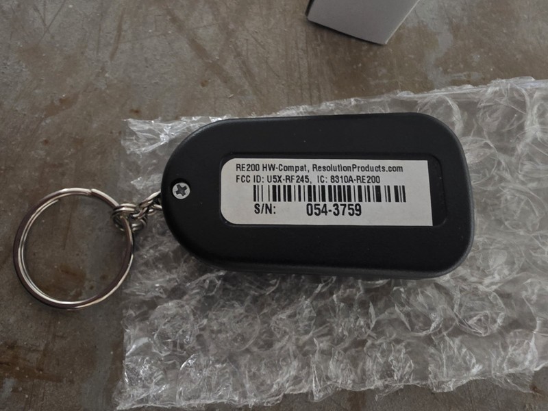 Honeywell RE200 Compatible Key Fob P/N U5X-RF245 Used gallery