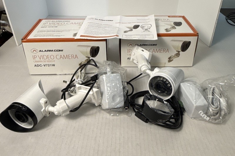Alarm.com IP Video Camera Bundle - Model: ADC-V721W - LOT OF 2 Untested Read gallery