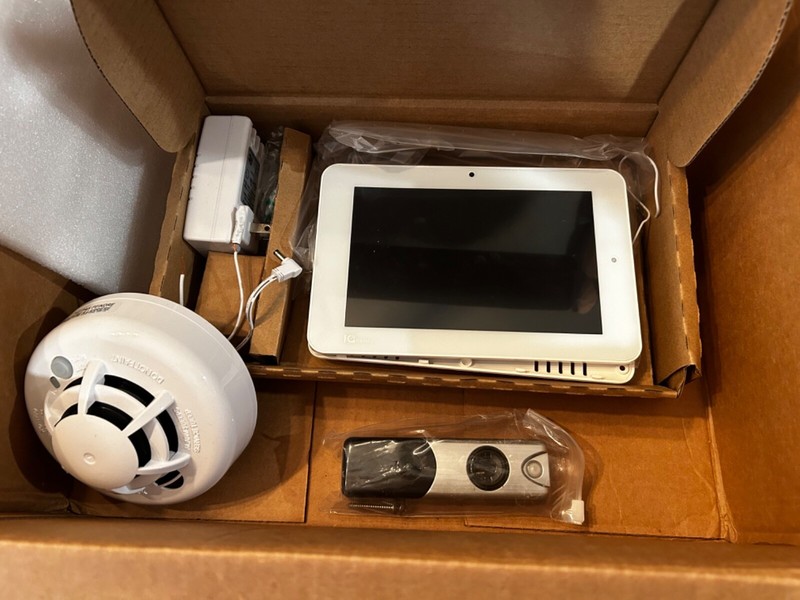 ADT smart screen, door camera and smoke alarm