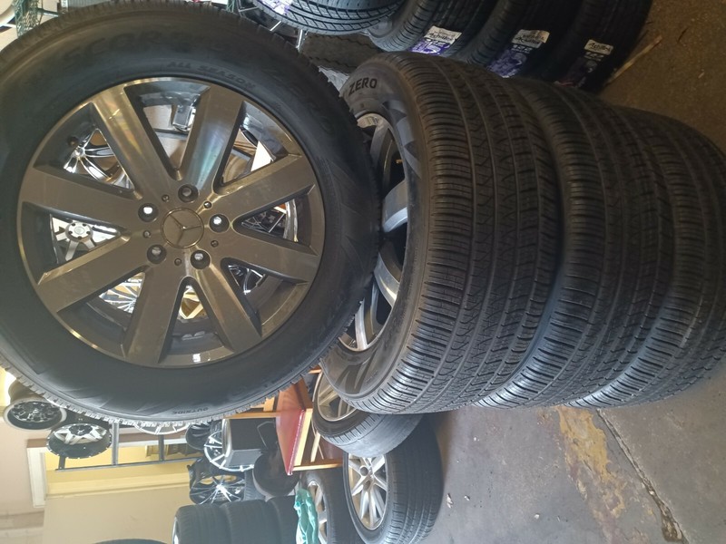 A SET OF MERCEDES G550 WAGON 19" FACTORY RIMS AN TIRES
