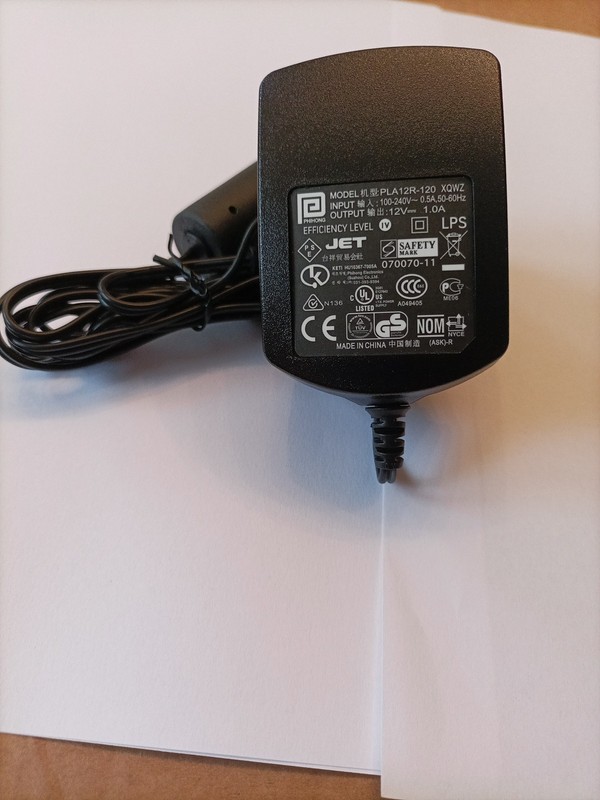 Phihong Model PLA 12R-120 Power Supply. 100-240V to 12v 1.aA