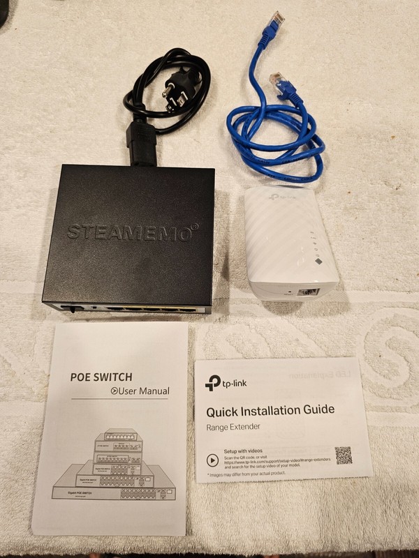 Network wire to wireless converter set up for use with Lorex wired camera