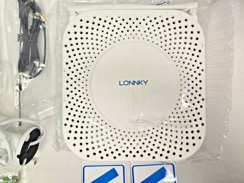 Lonnky Four Camera Wireless Network Video Surveillance Kit NEW Never Installed gallery