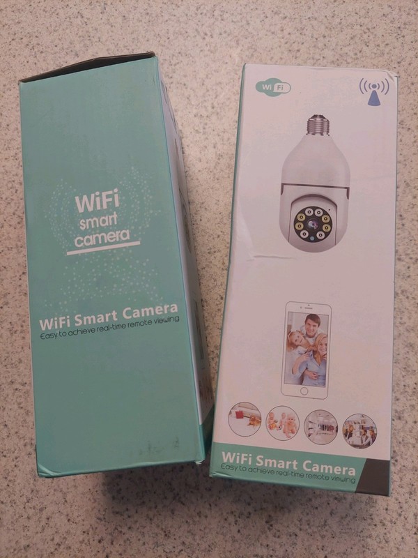 2 WiFi Smart Cameras, plug into wall outlet or screw into light socket. gallery