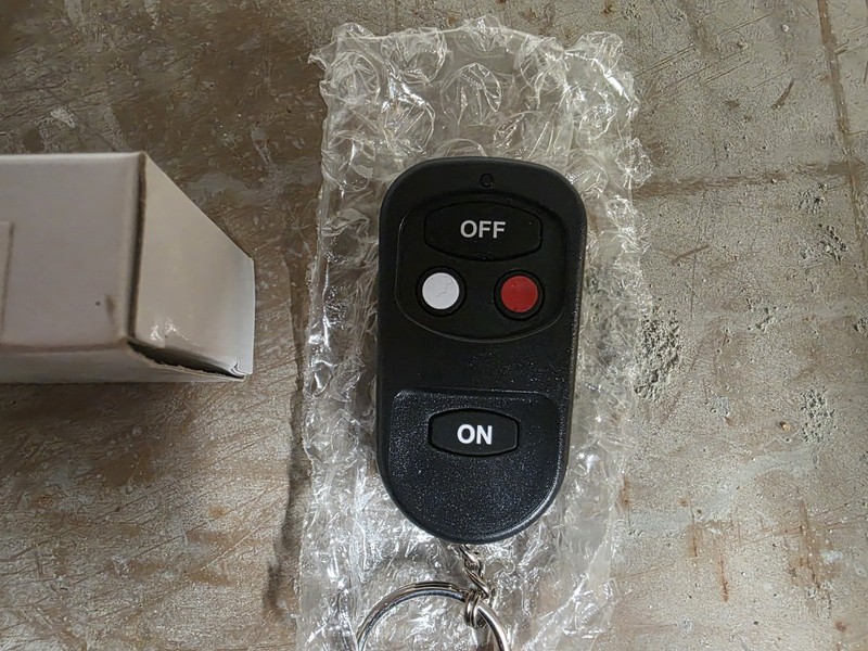 Honeywell RE200 Compatible Key Fob P/N U5X-RF245 Used gallery