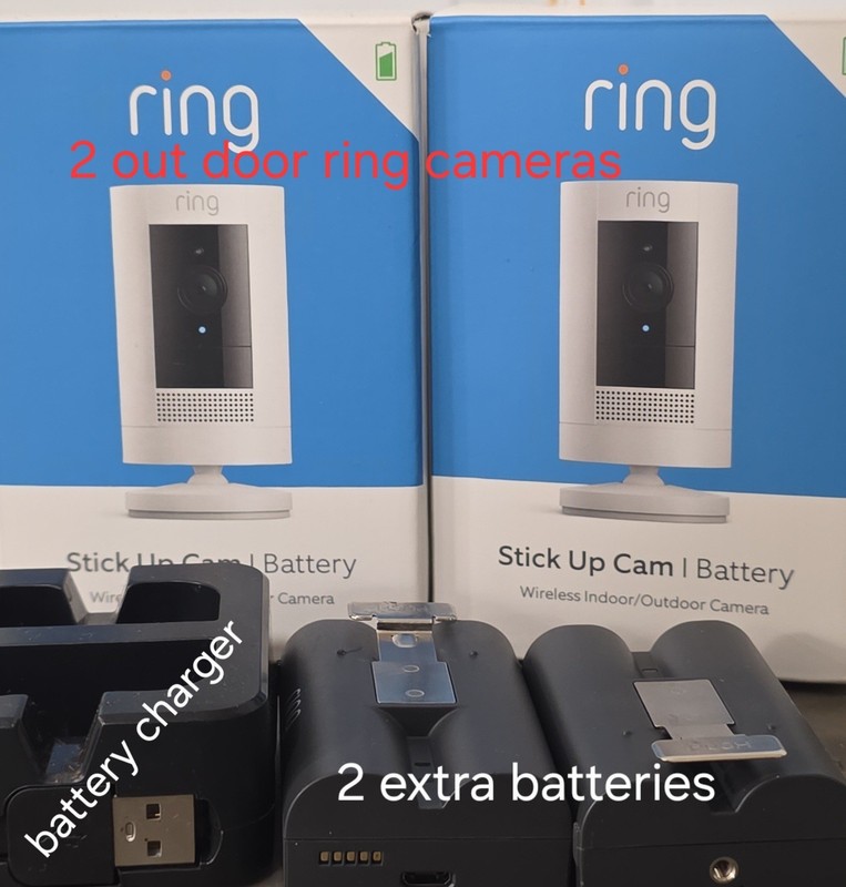 2 Ring Stick Up Outdoor Security Cameras, 2 extra batteries and charging station