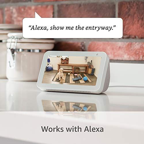 Ring Stick Up Cam Plug-In HD security camera with two-way talk, Works with Alexa gallery
