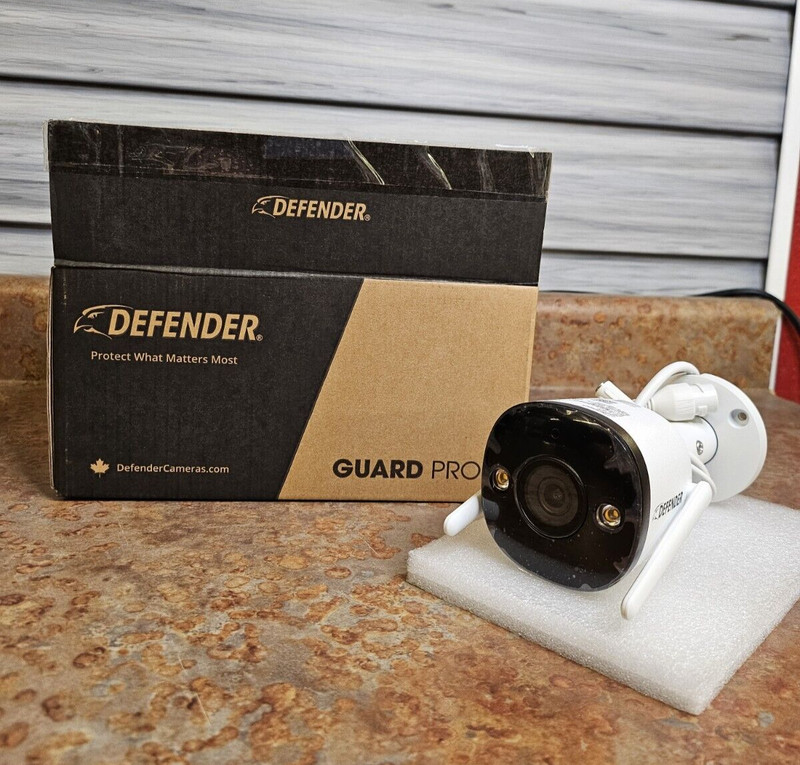 Defender Guard Pro 2K WiFi. Plug-in Security Cam with Color Night Vision – 32 GB