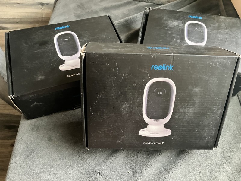 3 Reolink Argus 2 Security Cameras With SD Cards and Extended Charger Cords gallery