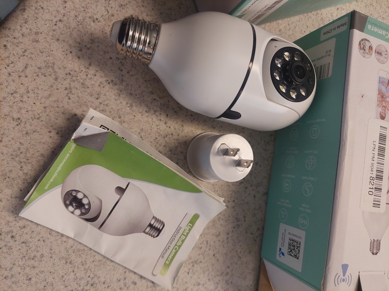 2 WiFi Smart Cameras, plug into wall outlet or screw into light socket. gallery