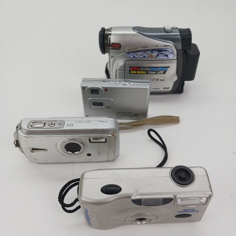 Camera Bundle Of (4) For Parts. Pentax Optio W10, JVC GR-D270U Sold As Seen