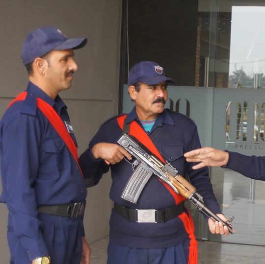 Veteran Security & Protection (Pvt) Ltd, security guards planing security protocols out side a office